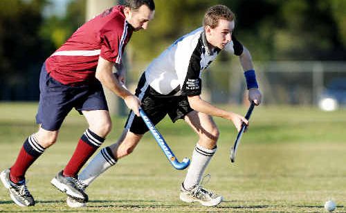 Not short of effort: Mark Short (right) gives it his all while playing for Magpies against the Fraser Flames. Not short of effort: Mark Short (right) gives it his all while playing for Magpies against the Fraser Flames.